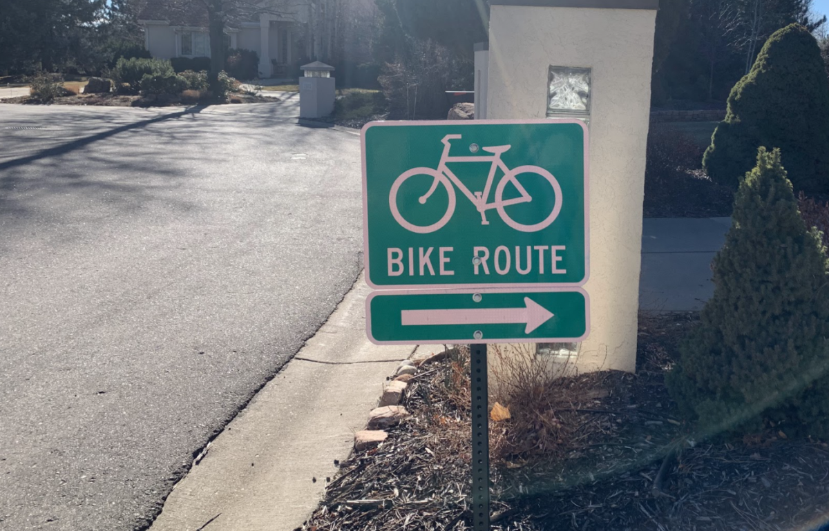 A bike route sign in Greenwood Village