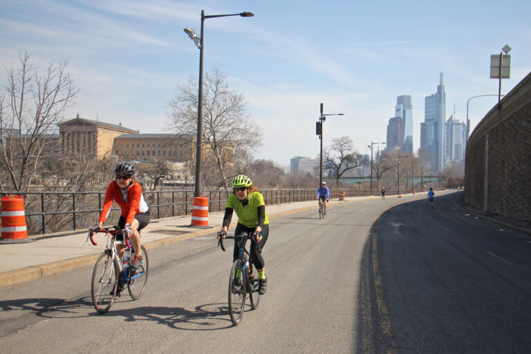 Cyclists and joggers use Martin Luther King Drive