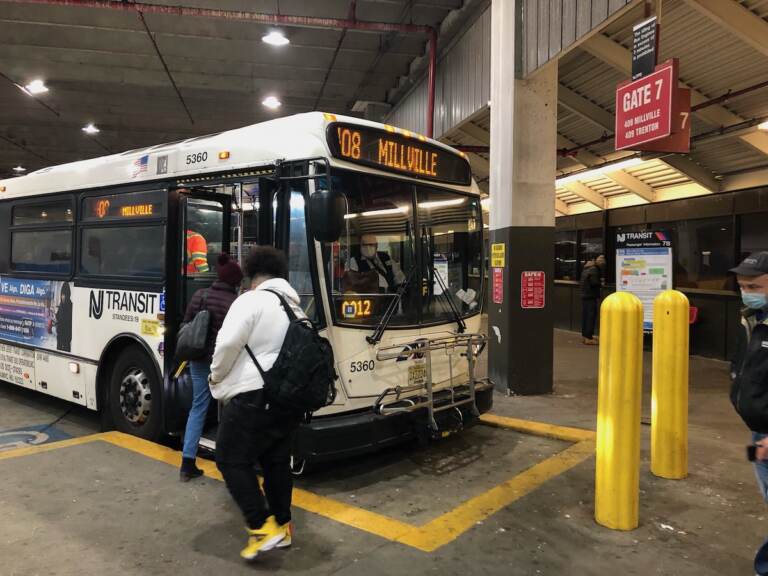 Passengers board NJ Transit Bus Route 408