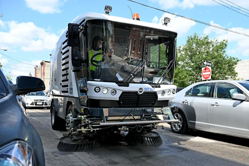 The Streets Department demonstrates their new four-foot-wide mechanical broom in North Philadelphia in August.