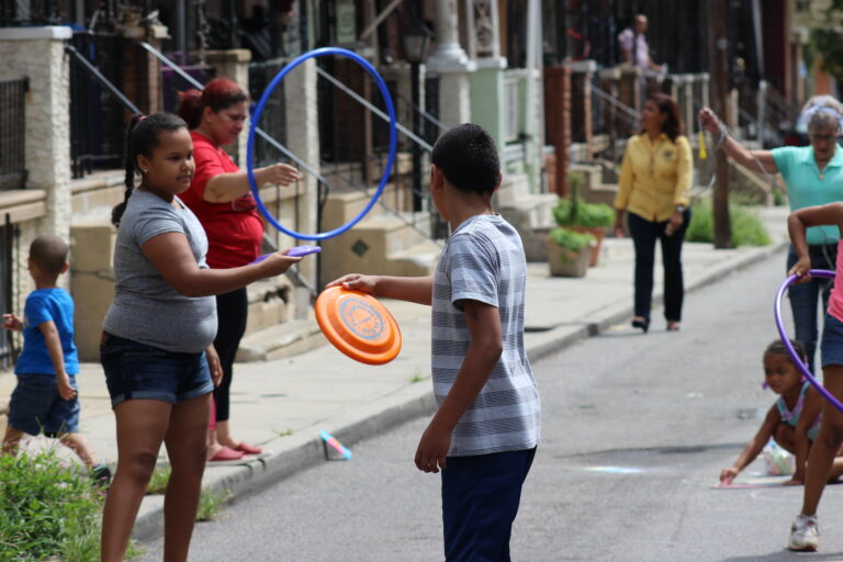 Families play on a North Philadelphia Playstreet in a 2018 photo.